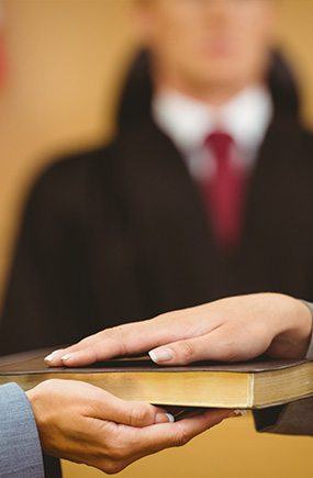 expert witness swearing an oath